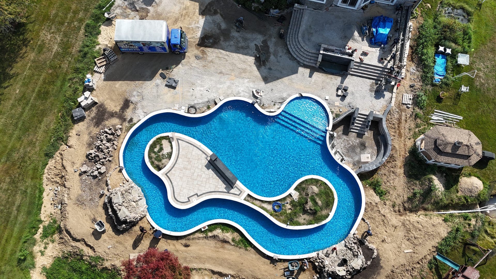 Travertine vs Bluestone for Pool Patios on Long Island