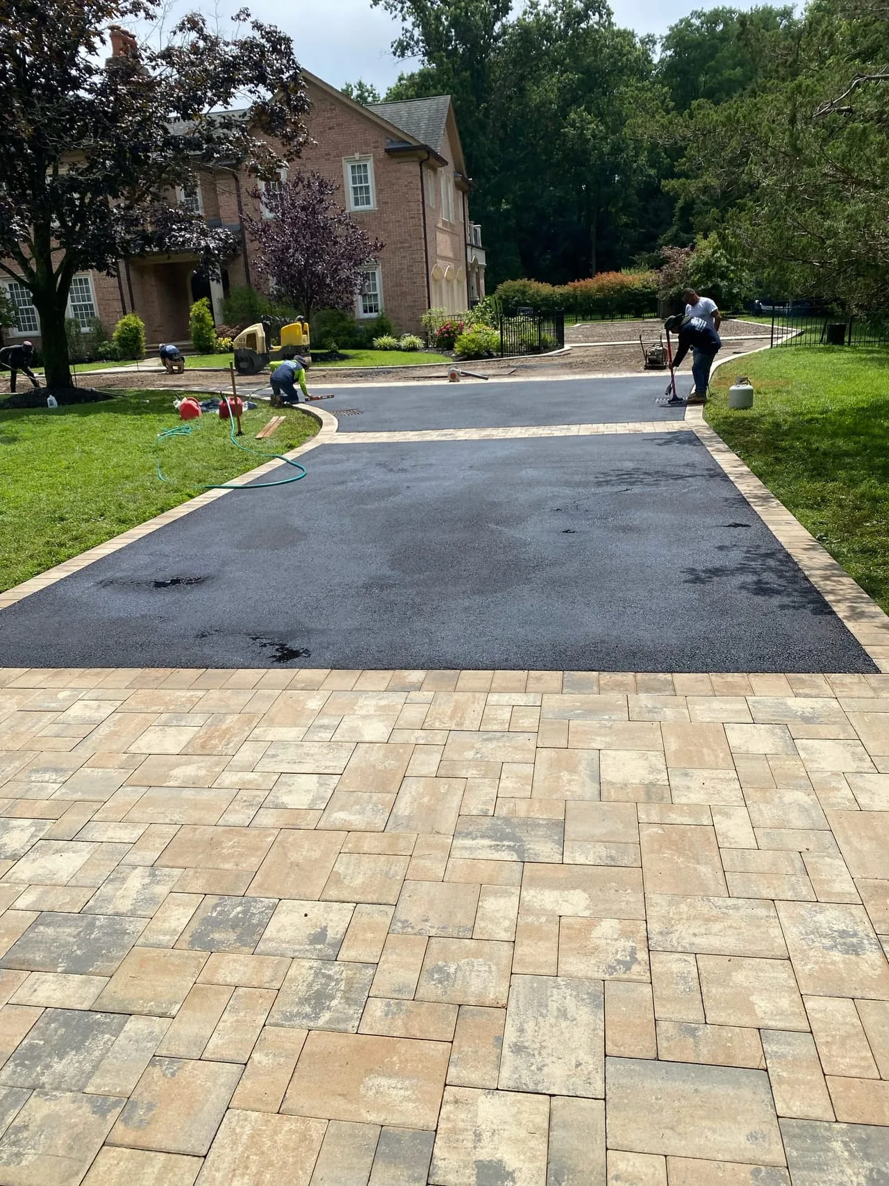 Asphalt paving and driveway work at Lloyd Harbor Gold Coast estate