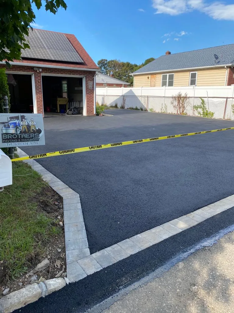 Asphalt driveway with Belgian block in Massapequa