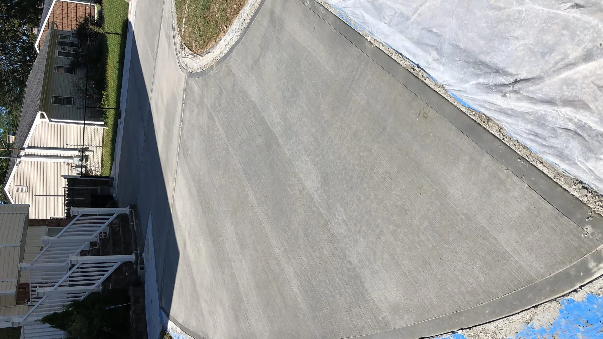 Concrete driveway transition on Long Island