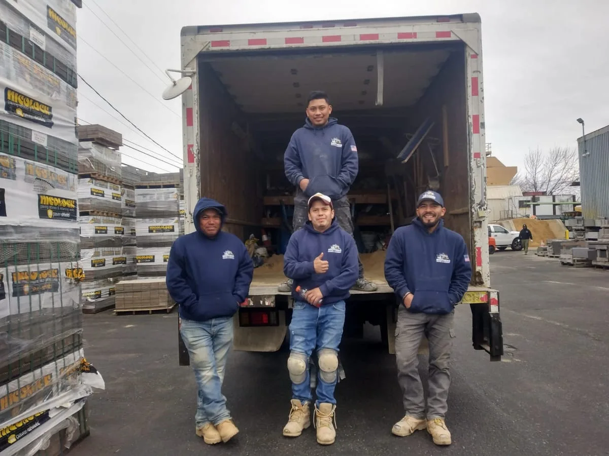 Brothers Paving crew at the supply yard in matching hoodies